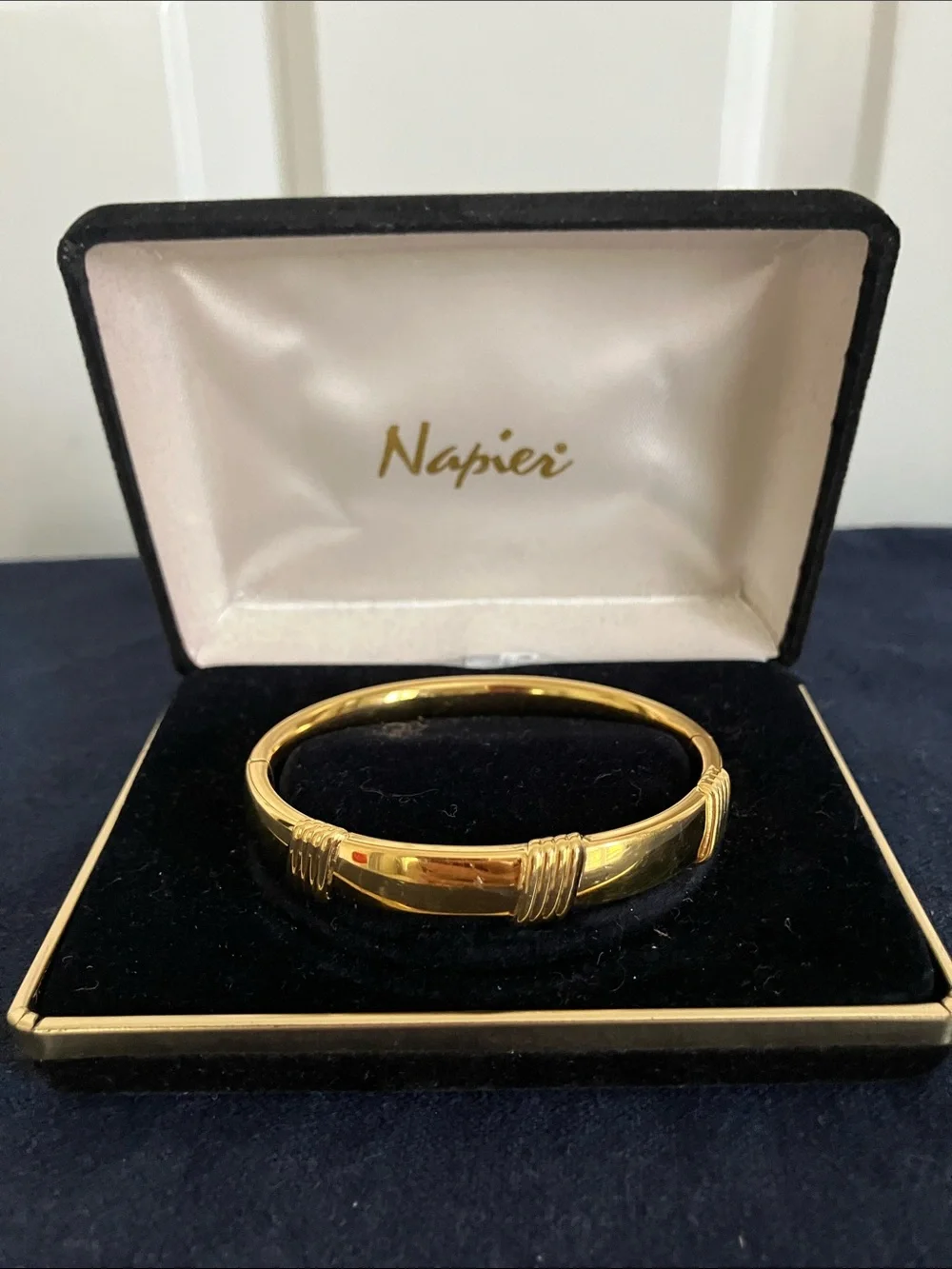 Napier Gold Tone Ribbed Accent Hinged Bangle Bracelet - Picture 1 of 5